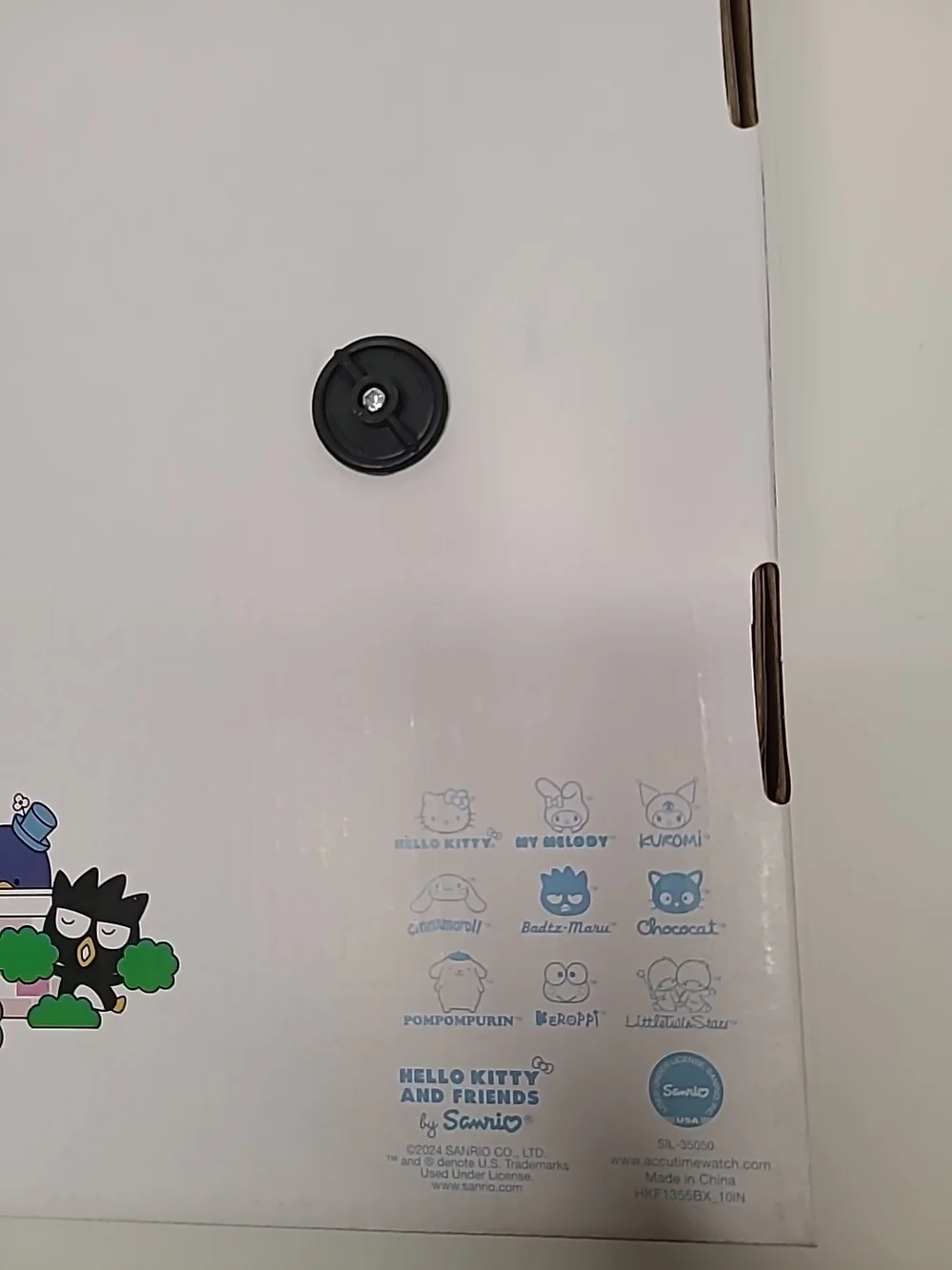 Hello Kitty Blue and Red Logo Wall Clock Packaging